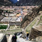 Walking up the steps of ancient Incan ruins at Ollantaytambo.
