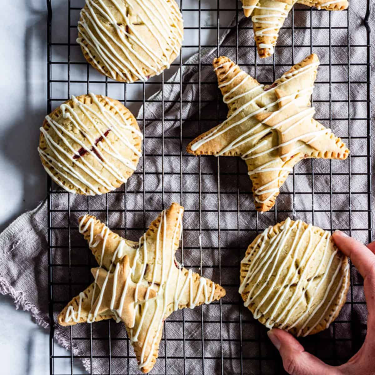 GlutenFree Raspberry Hand Pies with White Chocolate Drizzle Pass Me