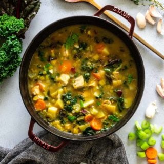 A large pot of chicken soup loaded with an assortment of veggies to aid in fighting off the flu.
