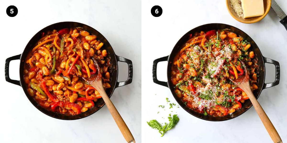 Gnocchi marinara in a skillet is garnished with chopped basil and finely grated parmesan.
