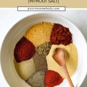 Cajun seasoning spices are added to a bowl.