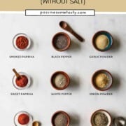 Spices used to make homemade Cajun seasoning mix are laid out on a marble countertop.