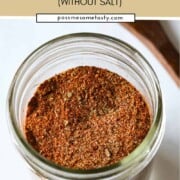 An open jar of homemade Cajun seasoning mix.