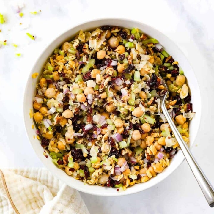 Celery, dried cranberries, and red onion are mixed into smashed chickpeas.