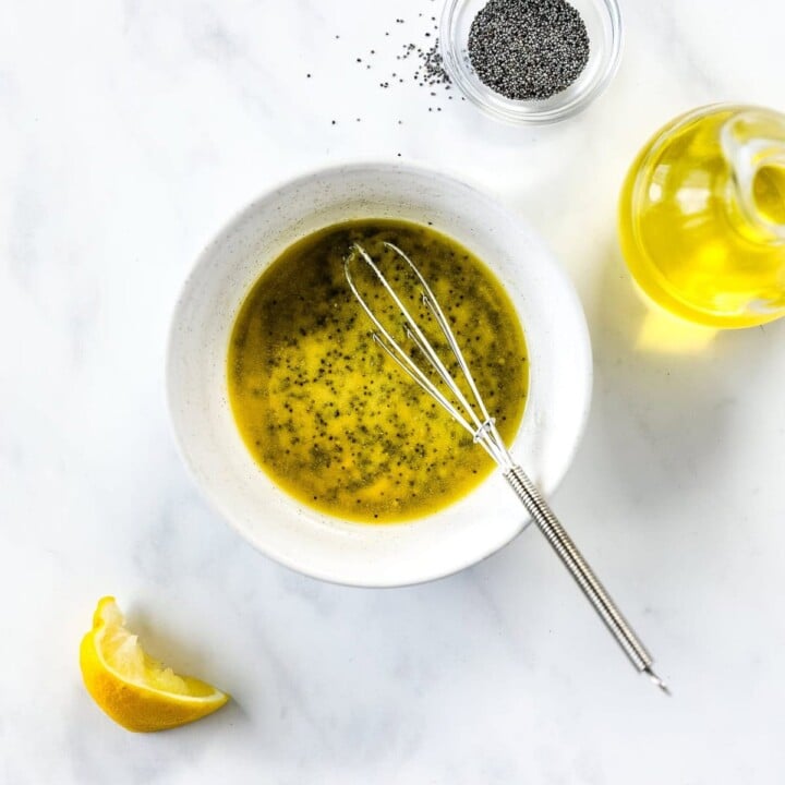 Ingredients for dijon poppy seed dressing are combined.